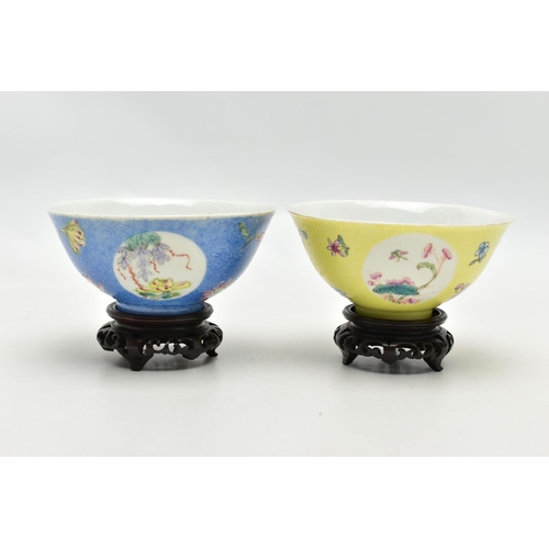 161 - TWO CHINESE PORCELAIN SGRAFFITO FOOTED BOWLS, one with a yellow ground, the other with a blue ground... 