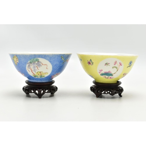 161 - TWO CHINESE PORCELAIN SGRAFFITO FOOTED BOWLS, one with a yellow ground, the other with a blue ground... 