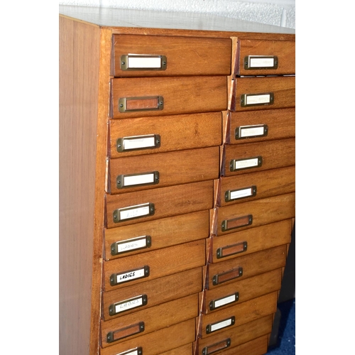 169 - OPTOMETRIST INTEREST: A 1960'S /70'S TEAK CHEST OF TWENTY-FOUR SHORT DRAWERS, each drawer with filin... 