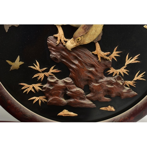 171 - A PAIR OF EARLY 20TH CENTURY SHIBAYAMA CIRCULAR PANELS AND ANOTHER SIMILAR OVAL, all three depicting... 