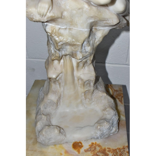 174 - A 20TH CENTURY CARVED ALABASTER FIGURE OF A FEMALE NUDE BATHER SEATED ABOVE A WATERFALL, formed of t... 