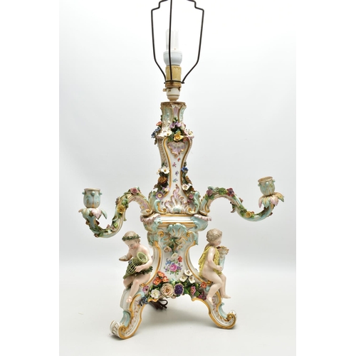 176 - A LATE 19TH CENTURY MEISSEN FIGURAL AND FLORAL ENCRUSTED CENTREPIECE ADAPTED TO A TABLE LAMP, the la... 