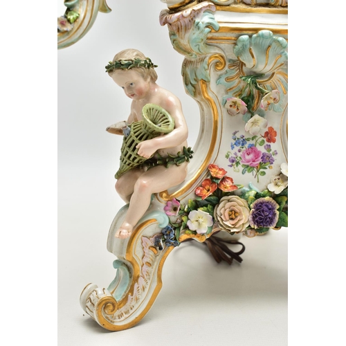 176 - A LATE 19TH CENTURY MEISSEN FIGURAL AND FLORAL ENCRUSTED CENTREPIECE ADAPTED TO A TABLE LAMP, the la... 