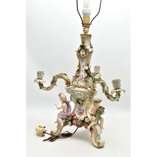 176 - A LATE 19TH CENTURY MEISSEN FIGURAL AND FLORAL ENCRUSTED CENTREPIECE ADAPTED TO A TABLE LAMP, the la... 