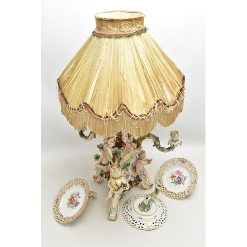 176 - A LATE 19TH CENTURY MEISSEN FIGURAL AND FLORAL ENCRUSTED CENTREPIECE ADAPTED TO A TABLE LAMP, the la... 