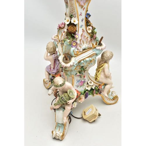 176 - A LATE 19TH CENTURY MEISSEN FIGURAL AND FLORAL ENCRUSTED CENTREPIECE ADAPTED TO A TABLE LAMP, the la... 