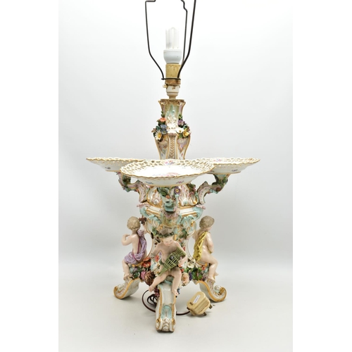 176 - A LATE 19TH CENTURY MEISSEN FIGURAL AND FLORAL ENCRUSTED CENTREPIECE ADAPTED TO A TABLE LAMP, the la... 