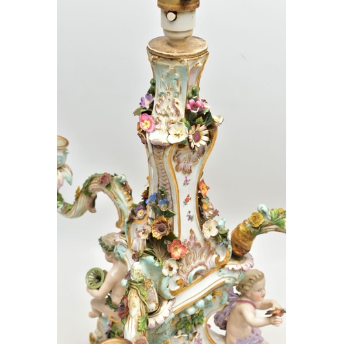 176 - A LATE 19TH CENTURY MEISSEN FIGURAL AND FLORAL ENCRUSTED CENTREPIECE ADAPTED TO A TABLE LAMP, the la... 