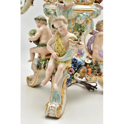 176 - A LATE 19TH CENTURY MEISSEN FIGURAL AND FLORAL ENCRUSTED CENTREPIECE ADAPTED TO A TABLE LAMP, the la... 