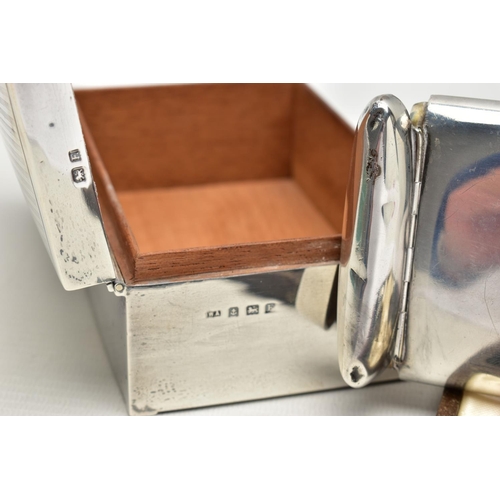 90 - A GEORGE V SILVER CIGARETTE CASE OF RECTANGULAR FORM WITH DOUBLE HINGED MECHANISM, the plain case en... 