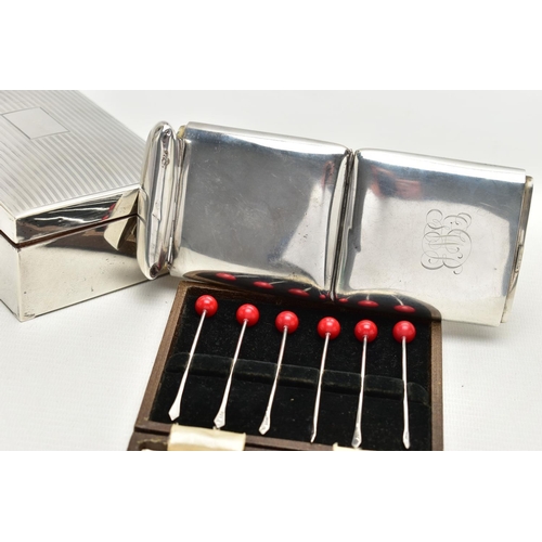 90 - A GEORGE V SILVER CIGARETTE CASE OF RECTANGULAR FORM WITH DOUBLE HINGED MECHANISM, the plain case en... 