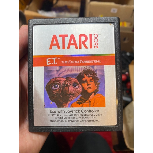 233 - ATARI 2600 CONSOLES AND GAMES, games include the notorious E.T., Jr. Pacman, Breakout, Super Breakou... 