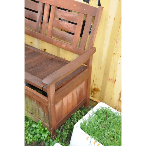 1024 - A TEAK GARDEN ROCKING CHAIR 63cm wide and a hard wood garden bench with under seat storage 121cm wid... 