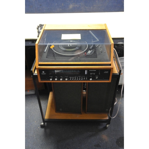 1056 - A DYNATRON SRX26 RADIO GRAM in a teak cabinet with plexi glass lid (crack to Tuner glass) a pair of ... 