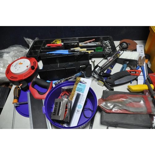 1058 - A PLASTIC TOOLBOX AND A BAG CONTAINING TOOLS, including an RS voltage tester, multimeter, a Stanley ... 