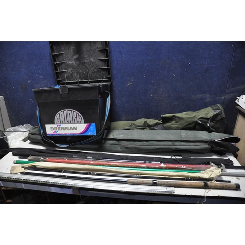 1077 - TWO FISHING ROD BAGS AND A BOX containing a Mitchel MQT Quiver tip rod, a Daiwa SGEM 11 Sensor Match... 