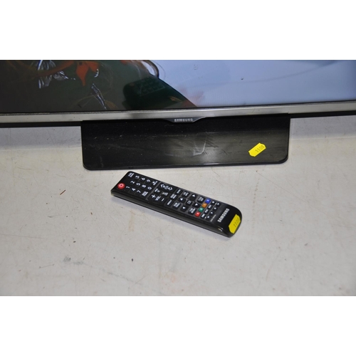 1108 - A SAMSUNG UE32H500AK 32in TV with remote (no back to remote) and a Samsung UE22D5003BW 22in TV no re... 