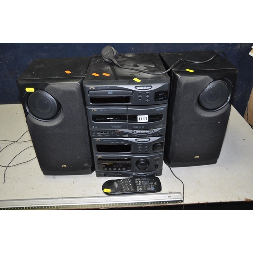 1111 - A JVC MX-56 HI FI SYSTEM with two matching speakers and remote (one motorised speaker inoperable, on... 