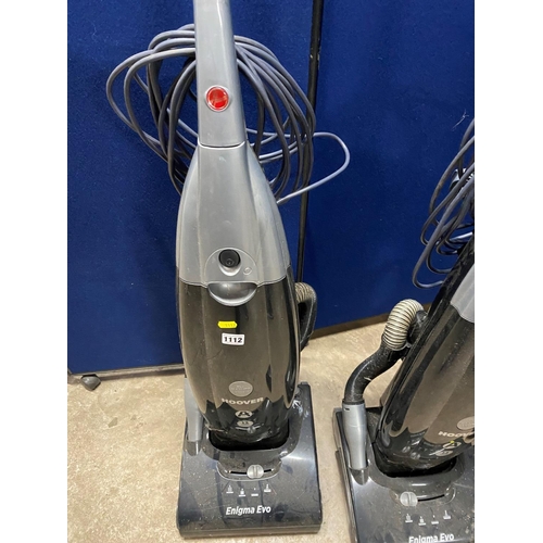 1112 - TWO HOOVER ENIGMA EVO VACUUM CLEANERS (both PAT pass and working but one brush bar noisy)