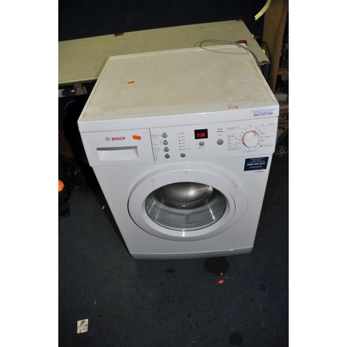 1115 - A BOSCH WLM40 WASHING MACHINE (PAT pass and powers up but not tested any further)