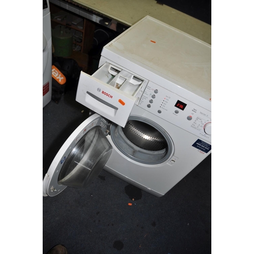 1115 - A BOSCH WLM40 WASHING MACHINE (PAT pass and powers up but not tested any further)