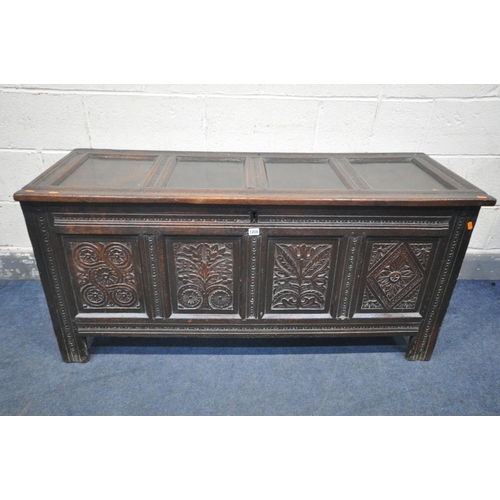 1208 - A GEORGIAN CARVED OAK PANELLED COFFER, length 141cm x depth 53cm x height 66cm (condition:-historica... 