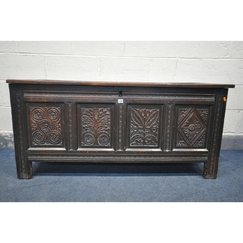 1208 - A GEORGIAN CARVED OAK PANELLED COFFER, length 141cm x depth 53cm x height 66cm (condition:-historica... 