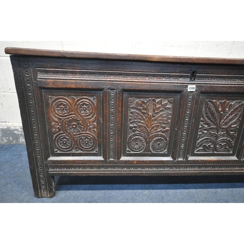 1208 - A GEORGIAN CARVED OAK PANELLED COFFER, length 141cm x depth 53cm x height 66cm (condition:-historica... 