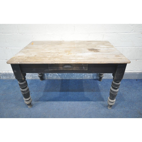 1218 - A LATE VICTORIAN PINE KITCHEN TABLE, with a single drawer, on a turned ebonised base, length 124cm x... 