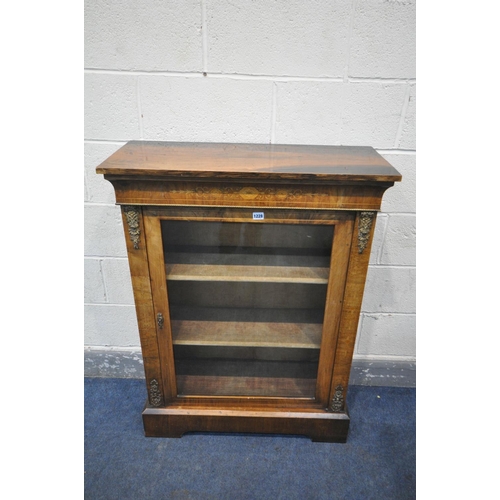 1228 - A VICTORIAN WALNUT AND MARQUETRY INLAID PIER CABINET, with a single glass door that's enclosing two ... 