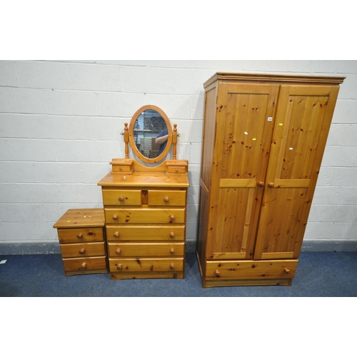 1236 - A MODERN PINE BEDROOM SUITE, comprising a double door wardrobe, width 91cm x depth 56cm x height 184... 