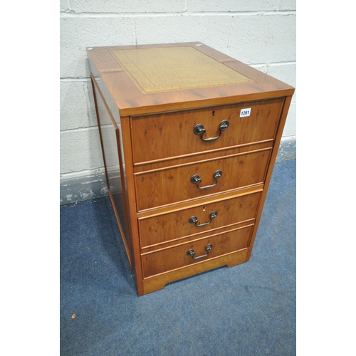 1261 - A YEW WOOD TWO DRAWER FILING CABINET, with a tan leather and inlaid writing surface, width 48cmx dep... 