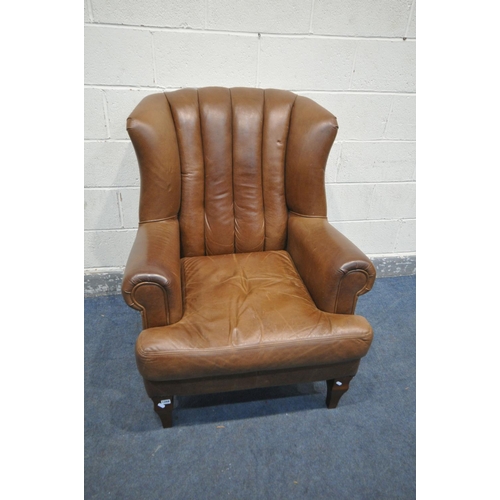 1268 - A BROWN LEATHER ARMCHAIR, with fluted back, on shaped front legs, width 89cm x depth 98cm x height 1... 