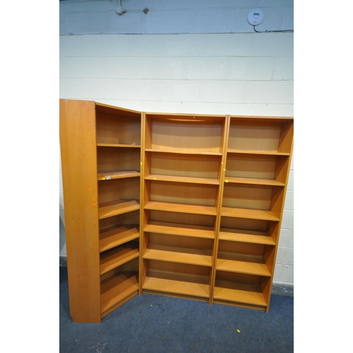 1282 - A SET OF THREE IKEA BEECH BOOKCASES, including a corner section, largest bookcase width 80cm x depth... 