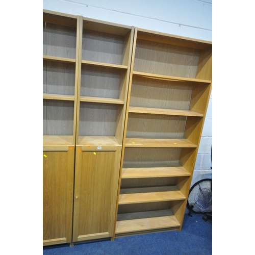 1283 - A SET OF FIVE IKEA OAK EFFECT OPEN BOOKCASES, including a corner section, three with cupboard doors,... 