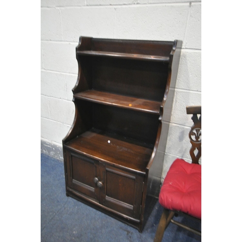 1289 - A DARK ERCOL WATERFALL BOOKCASE, with double cupboard doors, width 61cm x depth 35cm  x height 111cm... 