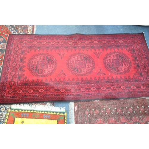 1293 - A PERSIAN HAMEDAN STYLE RED RUG, 168cm x 126cm, a modern foliate rug, a red Persian rugs, and three ... 