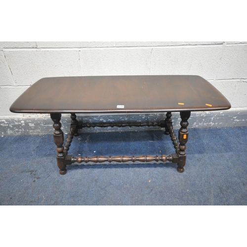 1294 - A DARK ERCOL COFFEE TABLE, length 105cm x depth 46cm x height 46cm