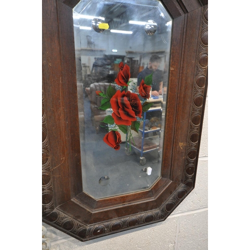 1297 - A PAIR OF OAK FRAMED GYPSY MIRRORS, along with two scrolled wrought framed wall mirrors, and a cheva... 