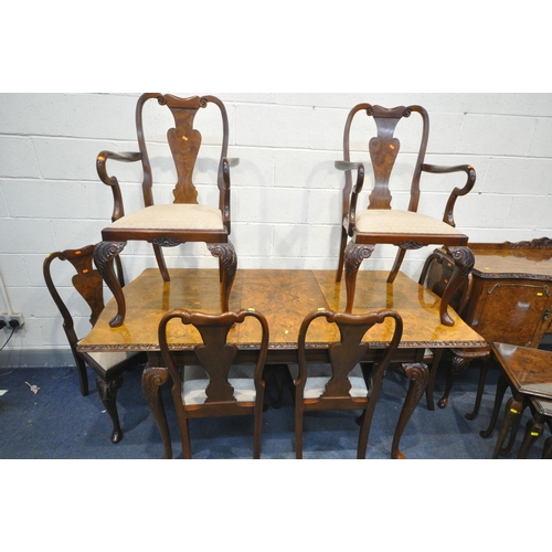 1306 - A QUEEN ANNE STYLE WALNUT EIGHT PIECE DINING SUITE, comprising an extending dining table open length... 