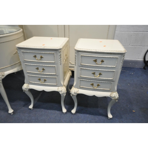 1307 - AN OLYMPUS FRENCH WHITE PAINTED FIVE PEICE BEDROOM SUITE, comprising two double door wardrobes, larg... 