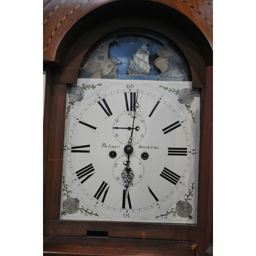 1310 - A GEORGE III MAHOGANY EIGHT DAY LONGCASE CLOCK, the hood with triple brass finials, barley twist Cor... 