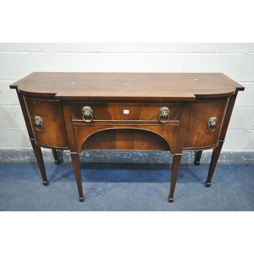 1314 - A GEORGIAN STYLE MAHOGANY SIDEBOARD, with double cupboard doors that's flanking two drawers, on squa... 