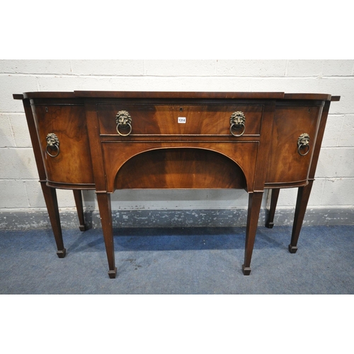 1314 - A GEORGIAN STYLE MAHOGANY SIDEBOARD, with double cupboard doors that's flanking two drawers, on squa... 