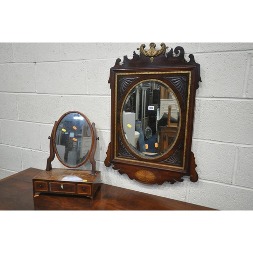 1316 - AN EARLY 19TH CENTURY MAHOGANY AND GILT FRETWORK FRAMED WALL MIRROR, with an oval bevelled plate, wi... 