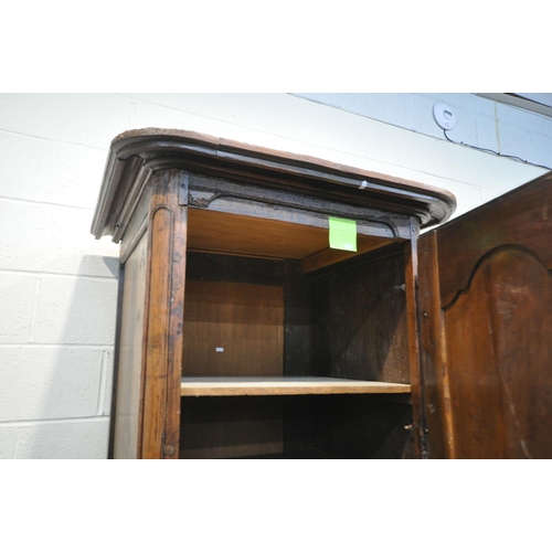 1323 - AN ANTIQUE FRUITWOOD SINGLE DOOR ARMOIRE, with an overhanging cornice, width 89cm x depth 76cm x hei... 