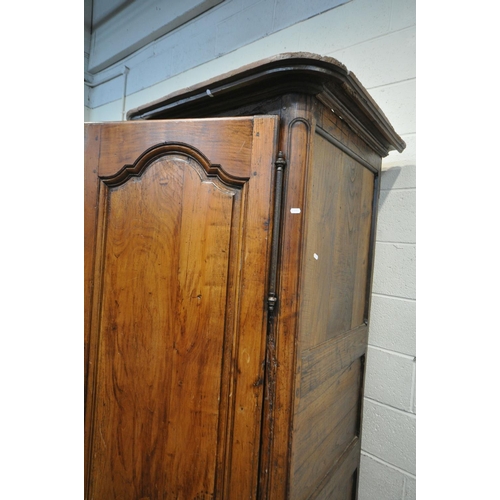 1323 - AN ANTIQUE FRUITWOOD SINGLE DOOR ARMOIRE, with an overhanging cornice, width 89cm x depth 76cm x hei... 