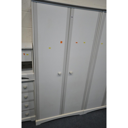 1328 - A MODERN WHITE FOUR PIECE BEDROOM SUITE, comprising two double door wardrobes, width 90cm x depth 52... 