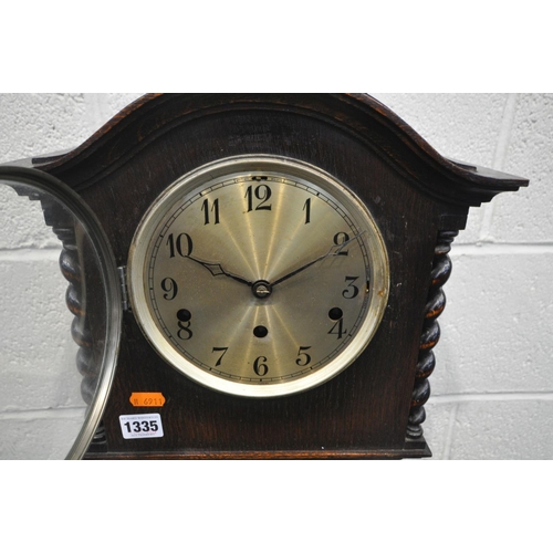 1335 - A 20TH CENTURY OAK CHIMING GRANDDAUGHTER CLOCK, height 148cm, with pendulum (condition:-good conditi... 