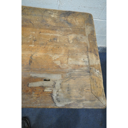 1339 - A 19TH CENTURY FARMHOUSE TABLE, the pine top with penny slots, three frieze drawers, on an oak base,... 